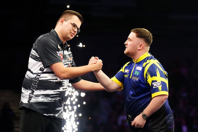 Luke Littler was beaten by Gian van Veen in his Premier League Darts opener (Owen Humphreys/PA)