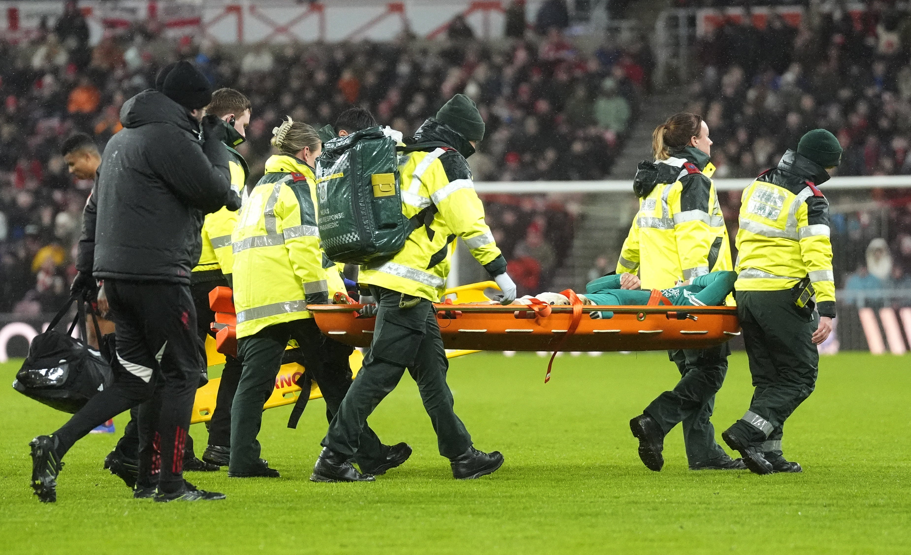 Wataru Endo left the game on a stretcher (Danny Lawson/PA)