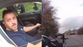 Police officer filmed clinging on to car door as fleeing drug dealer reversed down road