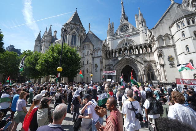<p>Protesters outside the Royal Courts of Justice on The Strand, central London, ahead of a hearing last July over whether proscribing of Palestine Action should be temporarily blocked</p>