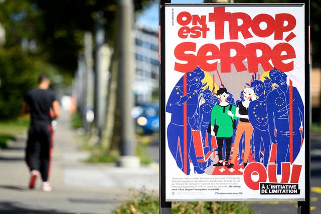 <p>A poster reads 'we're too tight!' in a street in Lausanne, Switzerland</p>