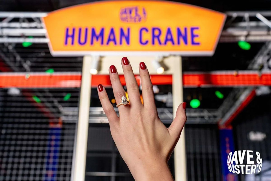 <p>The 3-carat diamond rings will be hidden in the prize pit of Human Crane games at Dave & Buster’s locations in New York and California</p>