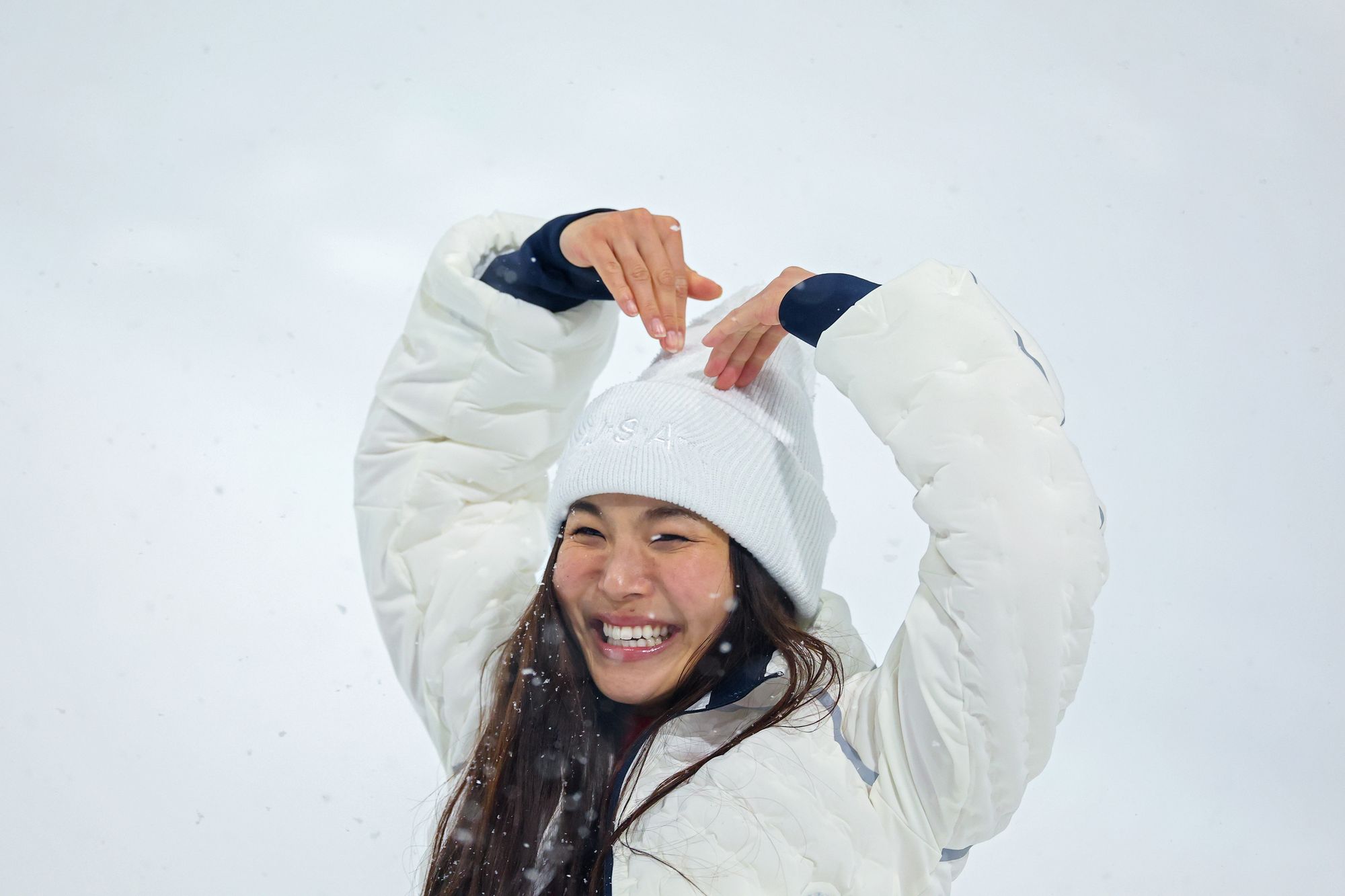 Silver medalist Chloe Kim of Team United States celebrates during the medal ceremony