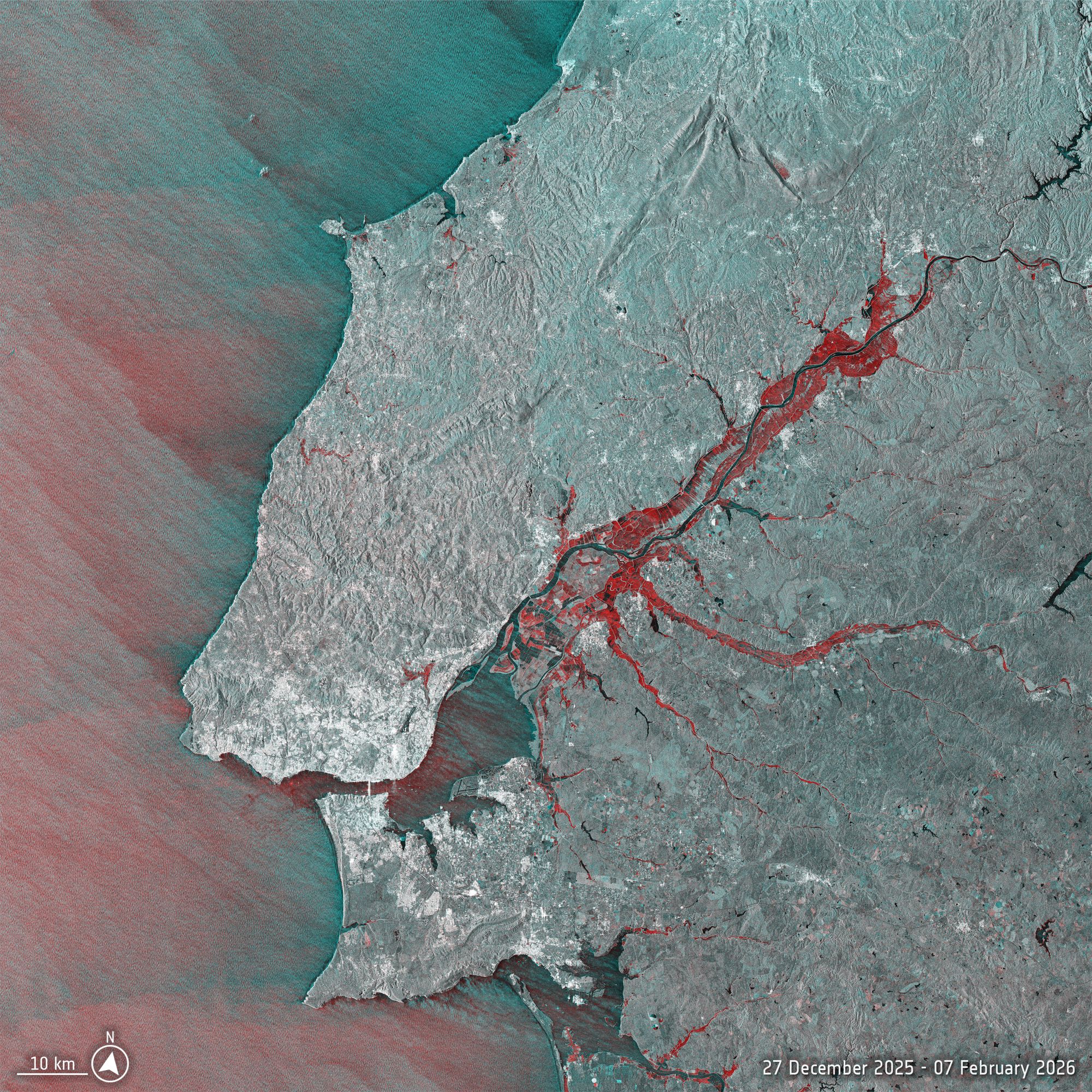 Satellite image shows area flooded around in Tejo River in red