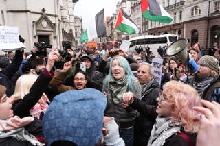 Crowds held banners and chanted slogans after the ban was deemed unlawful