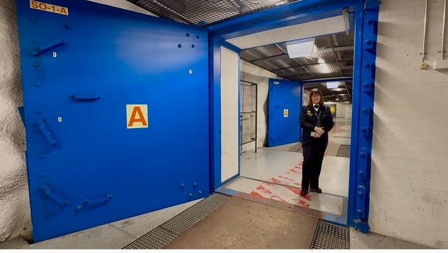 <p>The entrance to Merihaka underground shelter in central Helsinki has a blast-proof wall between the doors</p>
