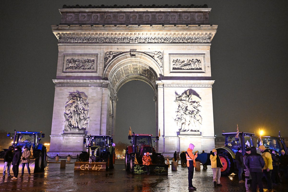 Armed man shot at Arc de Triomphe in Paris after trying to attack police