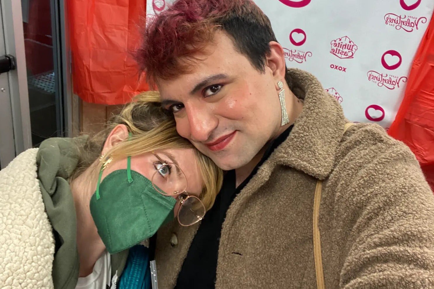 Alex Remnique and their wife Caila during their Valentine's Day visit to White Castle in 2023