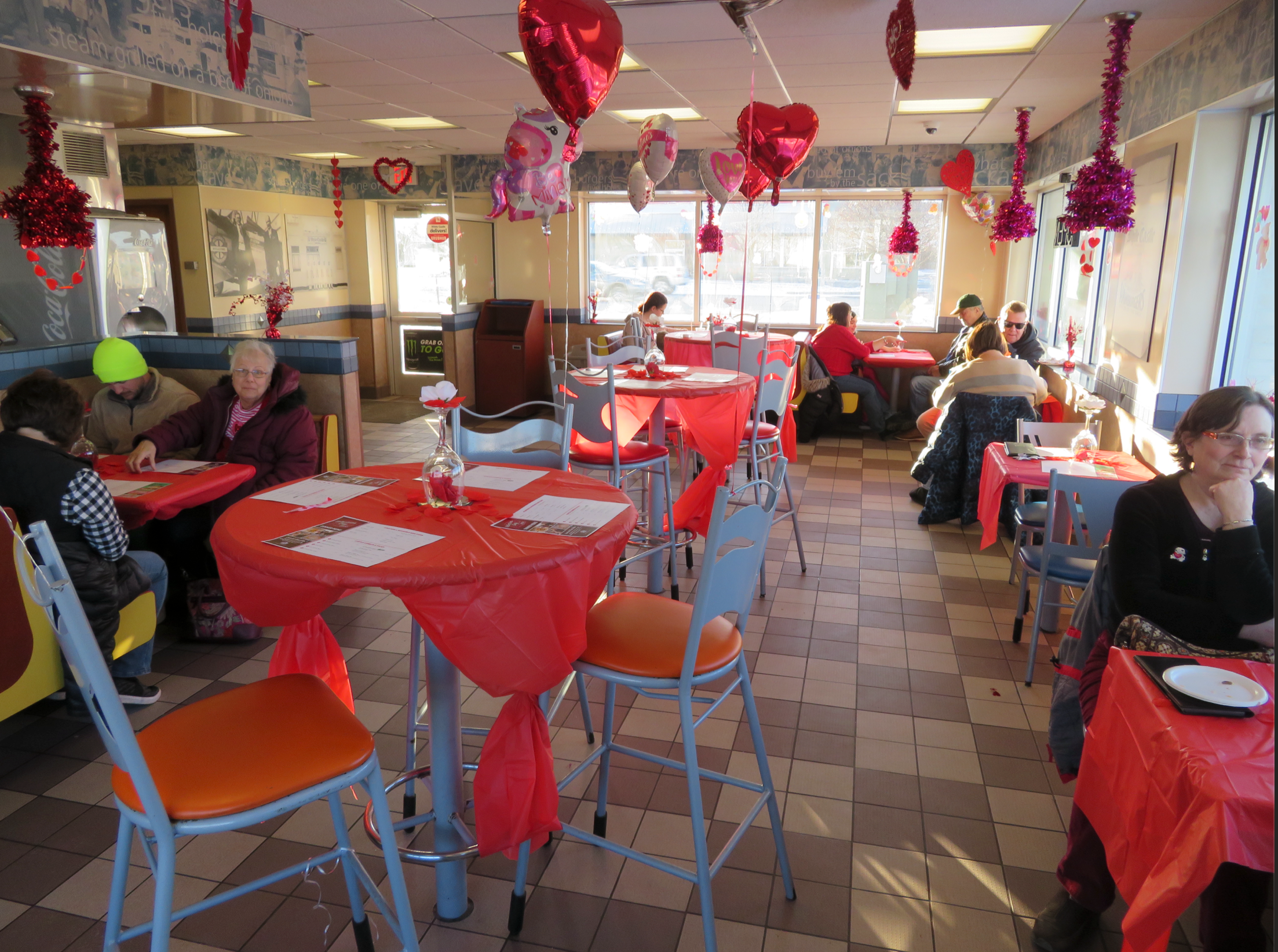 Vicky Ann Chegash, seated right, at one of White Castle's special Valentine's Day dinners in Michigan