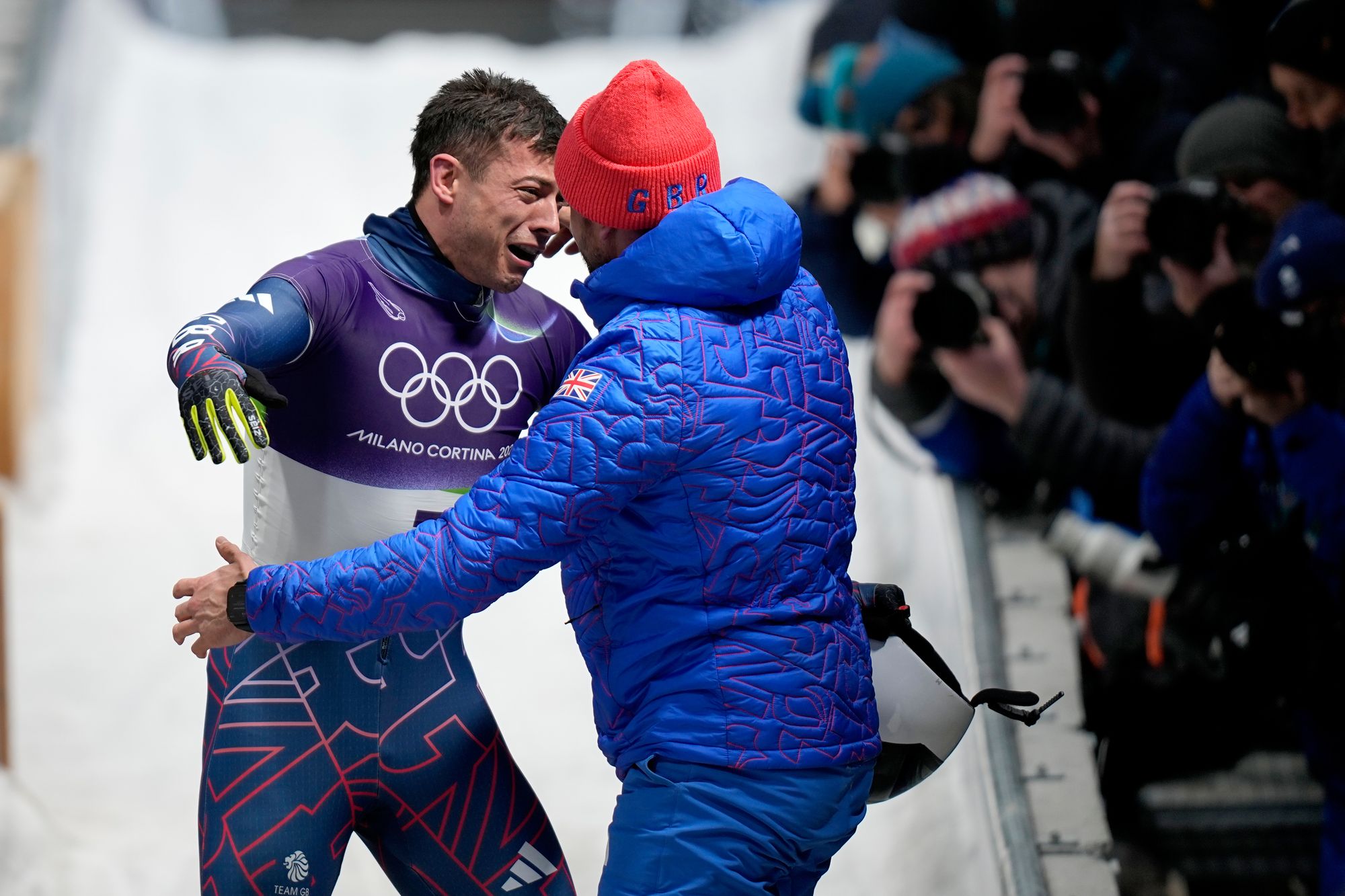 Weston embraced his coach as the GB-supporting crowd went wild
