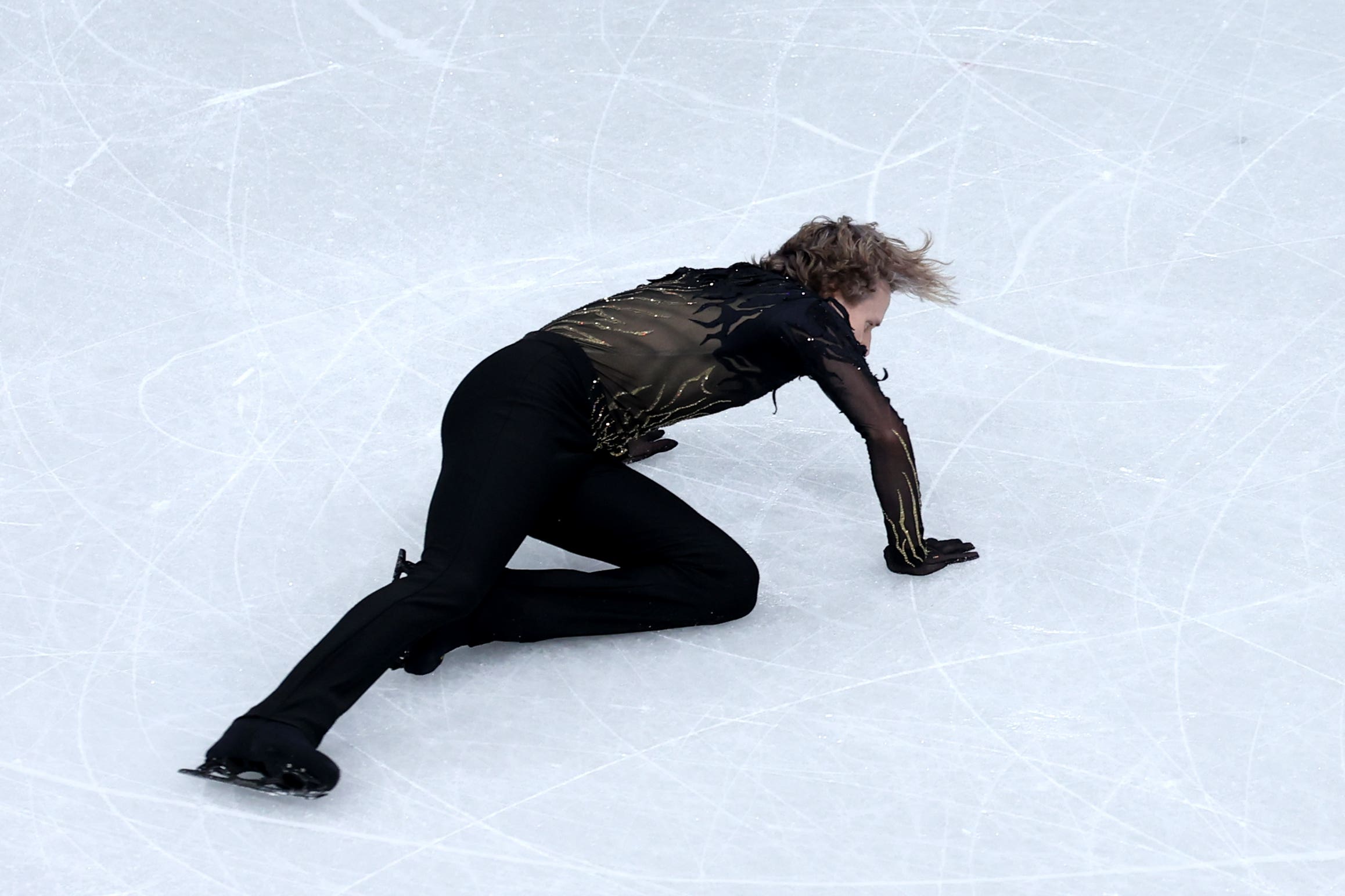 ‘Quad God’ Ilia Malinin crashed out of medal contention in Milan (Fabrizio Carabelli/PA)