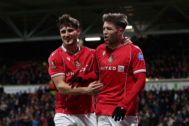 <p>Josh Windass of Wrexham celebrates after scoring</p>