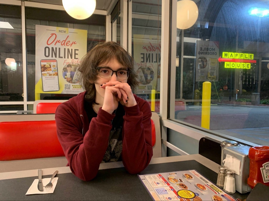 Erin Crowley at a Waffle House a few days before Valentine's Day, when they visited just after partner Augustine Isbell arrived from Oregon