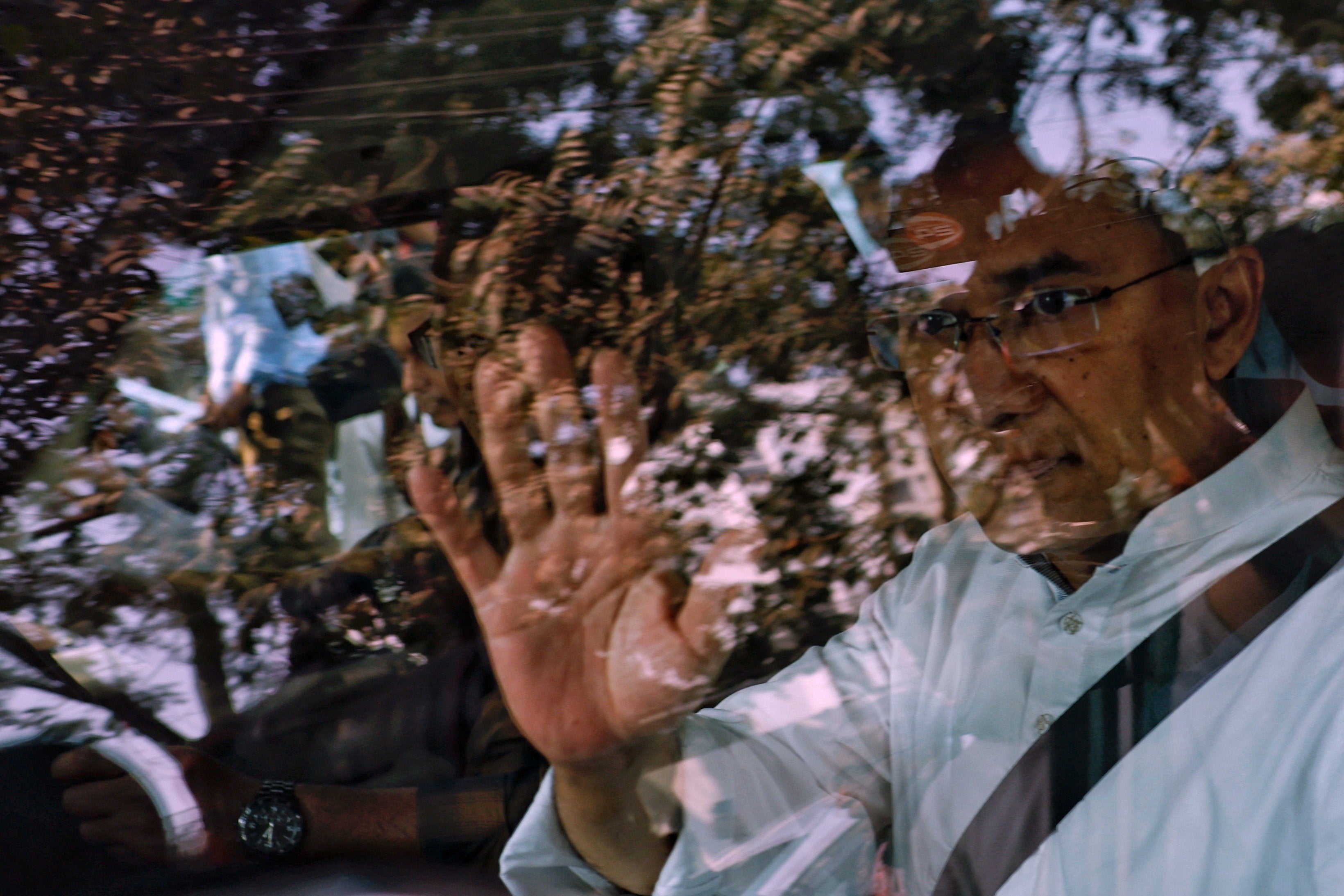 Tarique Rahman, chairman of Bangladesh Nationalist Party (BNP), waves from a car on his way to the mosque to attend Friday prayer, as results project BNP's victory in the 13th general election, in Dhaka, Bangladesh, 13 February 2026