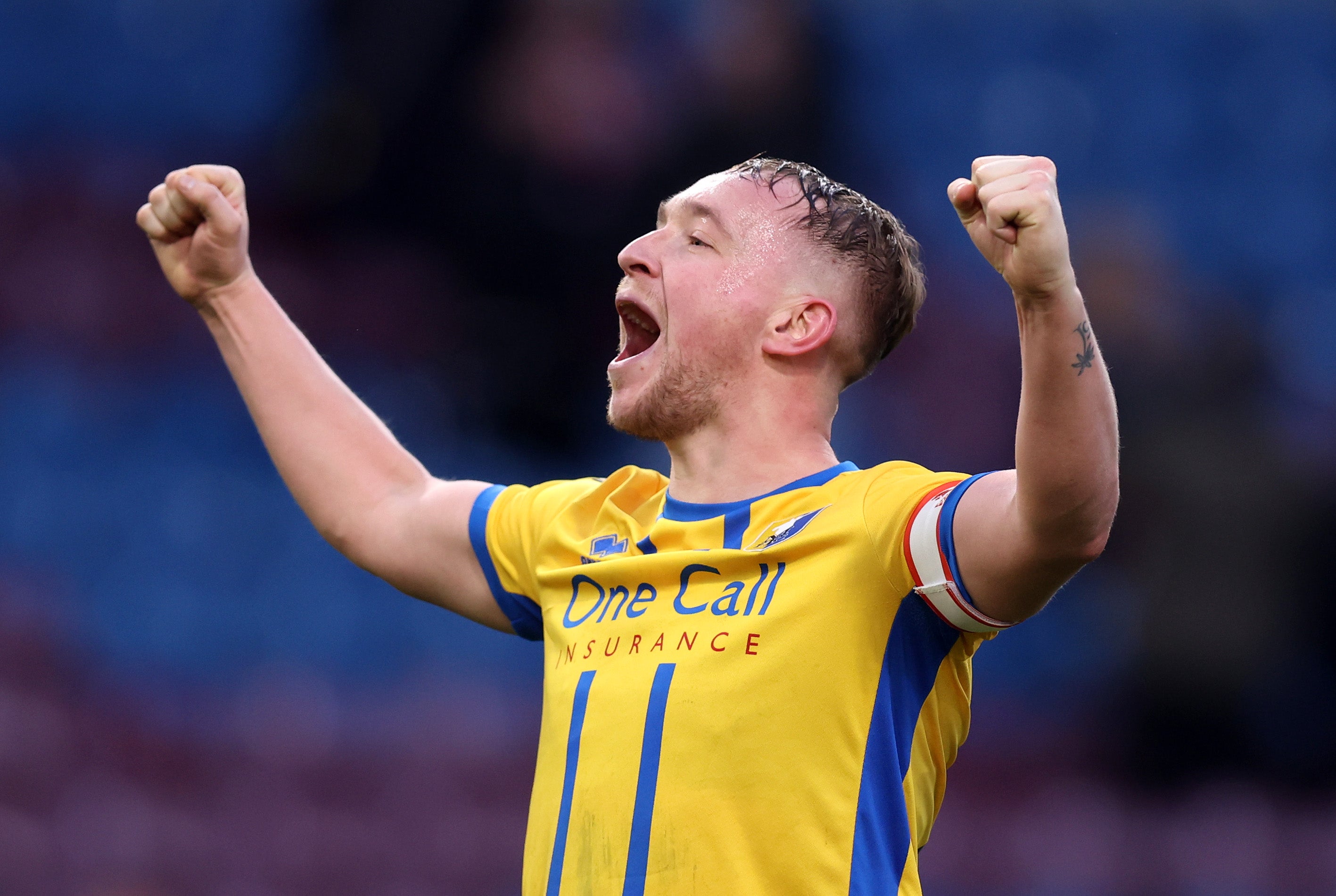 Louis Reed of Mansfield Town celebrates victory