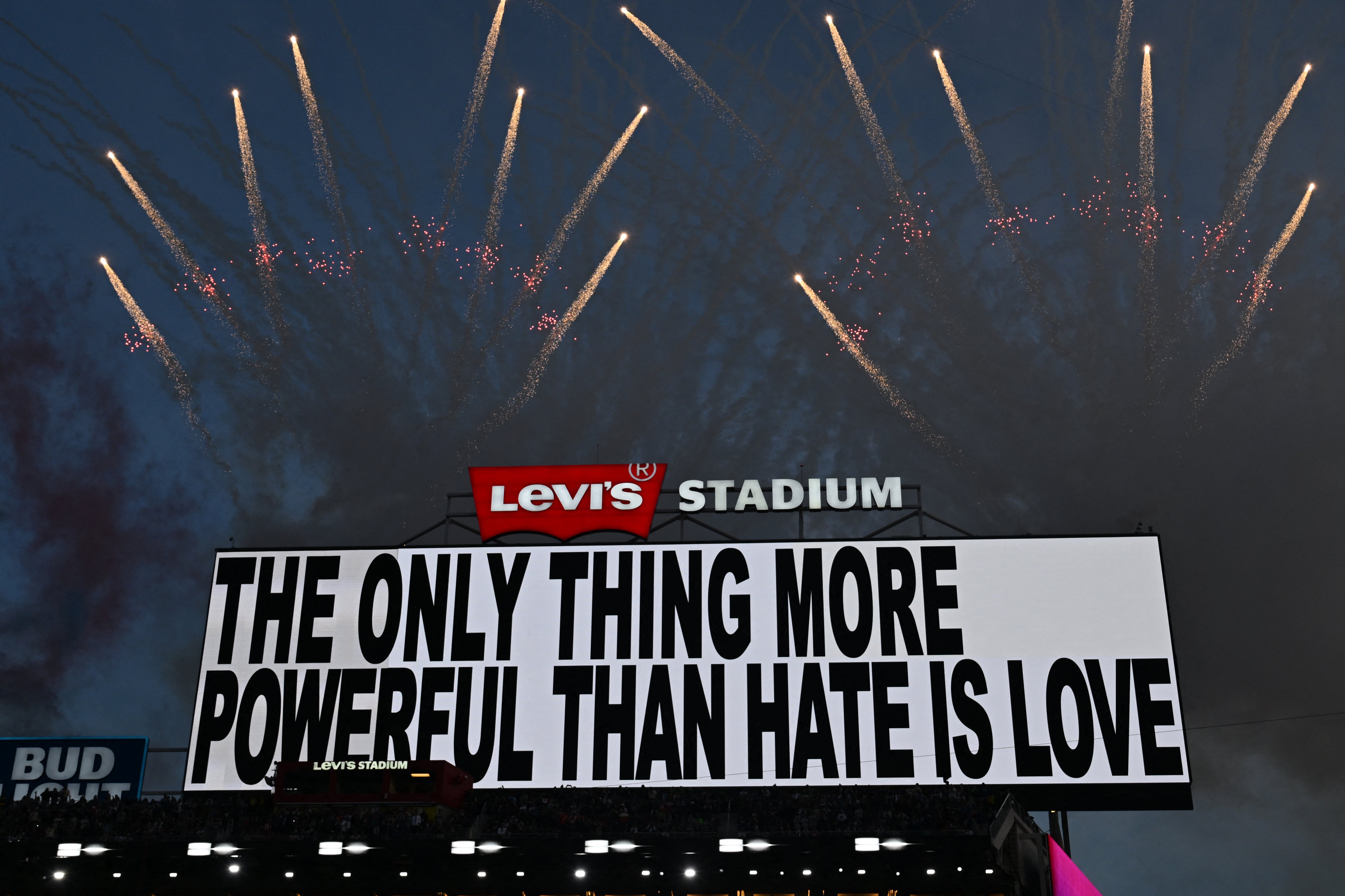 As Bad Bunny performed, a message was displayed on the stadium's scoreboard: 'The only thing more powerful than hate is love'