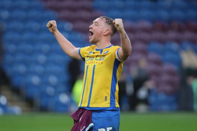 Louis Reed celebrates his winning goal against Burnley (Richard Sellers/PA)