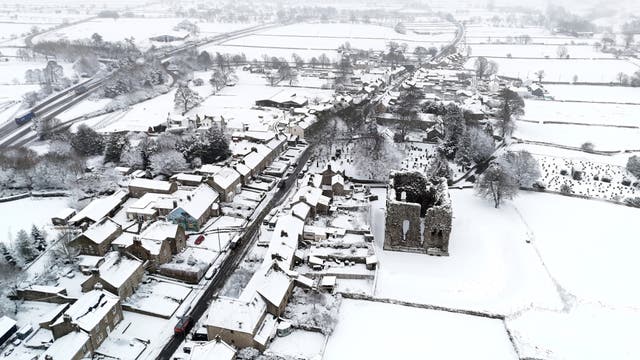 <p>Yellow weather w arnings for snow and ice remain in force across parts of the UK</p>