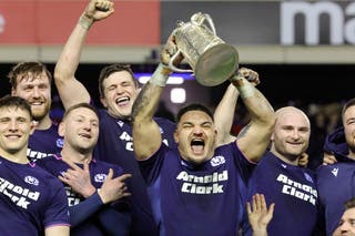 Scotland captain Sione Tuipulotu lifts the Calcutta Cup