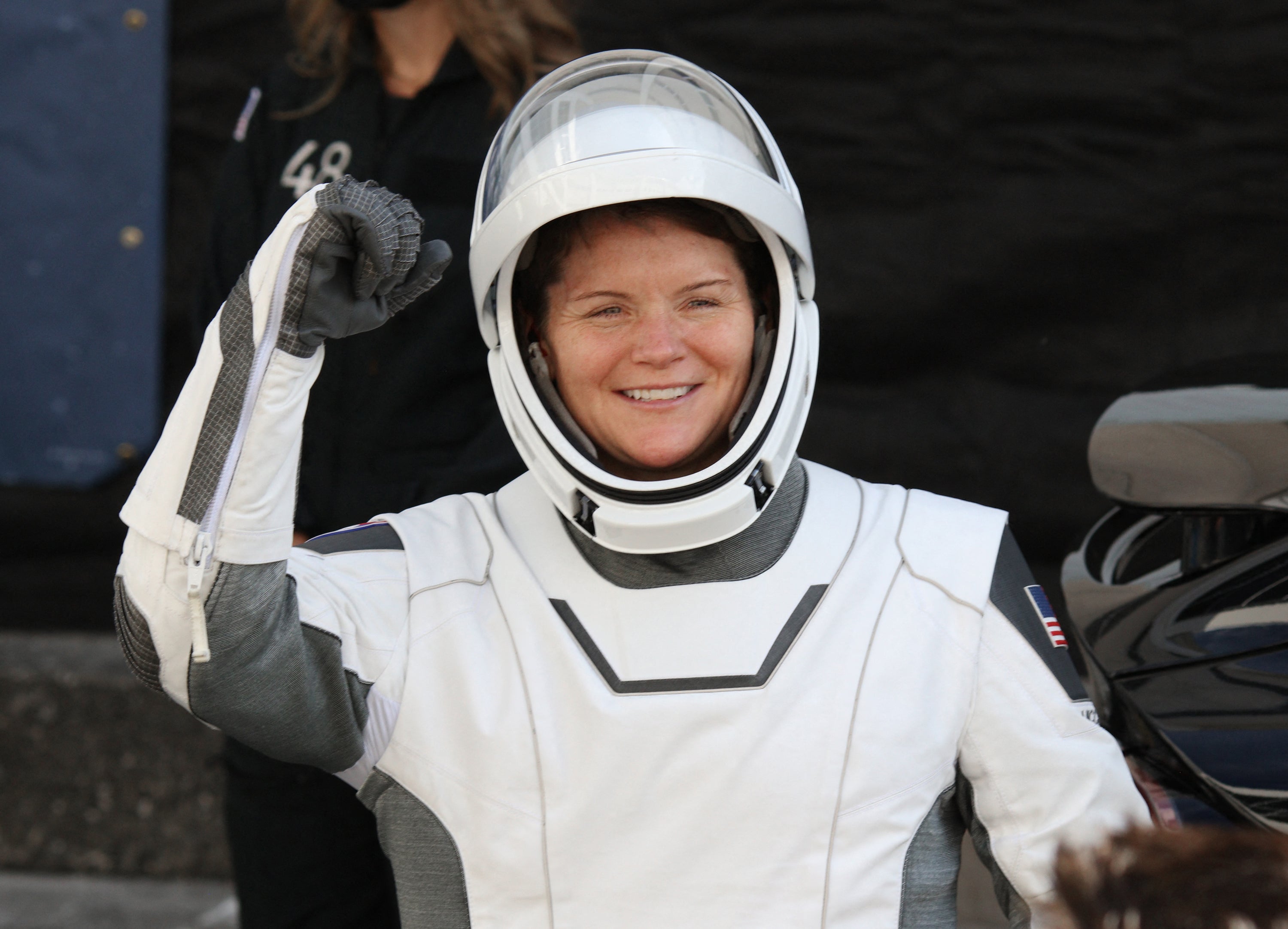 NASA astronaut Anne McClain gestures as she prepares to launch for a mission in March 2025. Her ex-wife, Summer Heather Worden, was sentenced to jail time this week after she pleaded guilty to lying to law enforcement