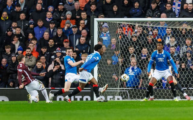 Thrilling title race takes twist as Rangers come from behind to beat ...