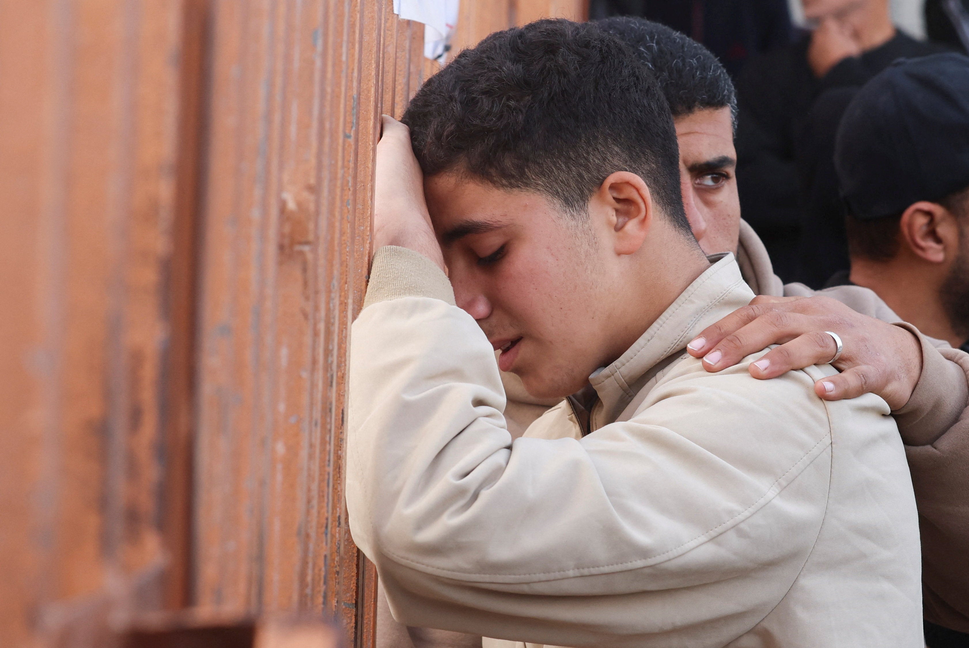 <p>Mourners react during the funeral of Palestinians killed in an overnight Israeli strike, according to medics, at Nasser Hospital in Khan Younis in the southern Gaza Strip</p>