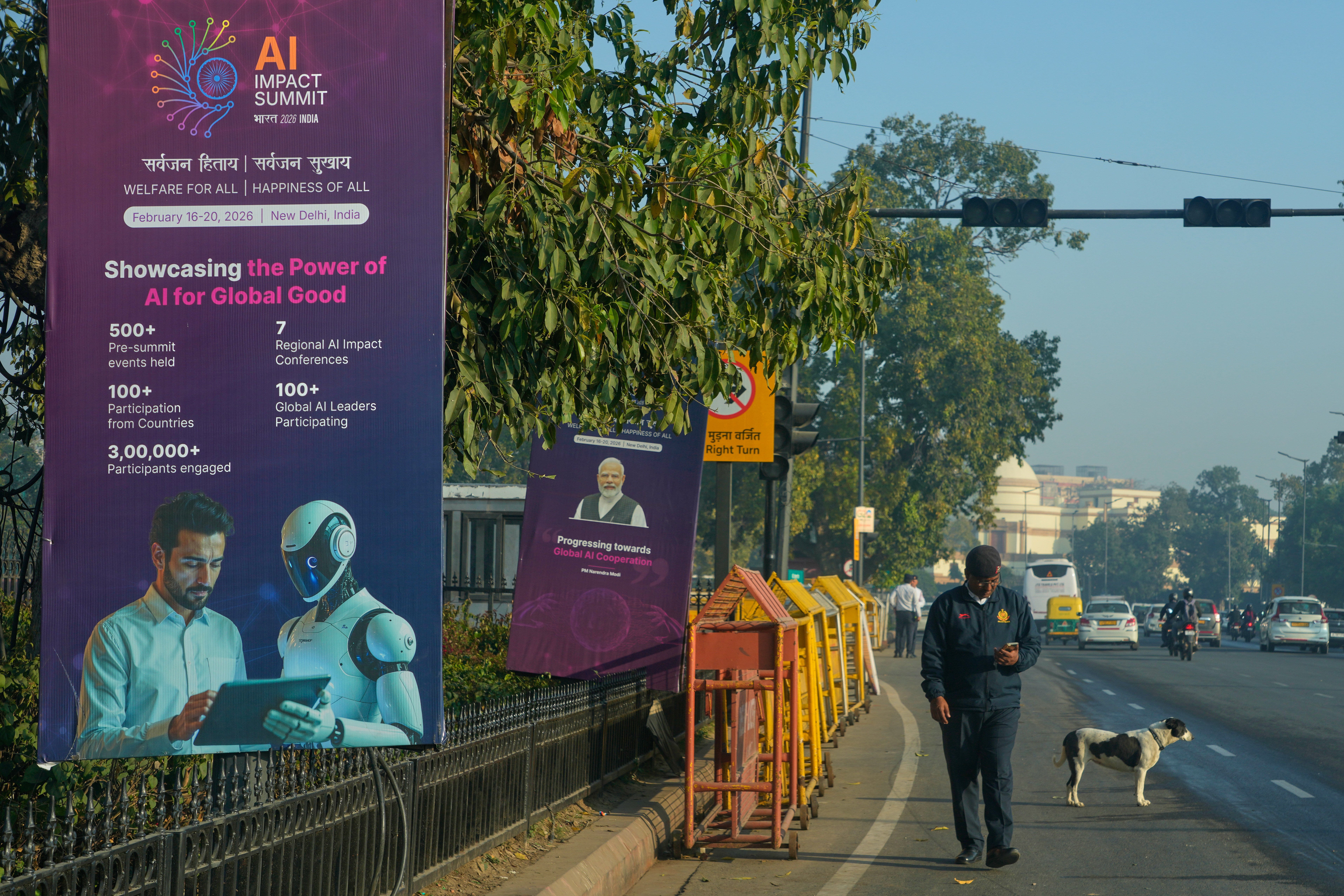 Banners from a road leading to the AI summit in Delhi, India on Monday