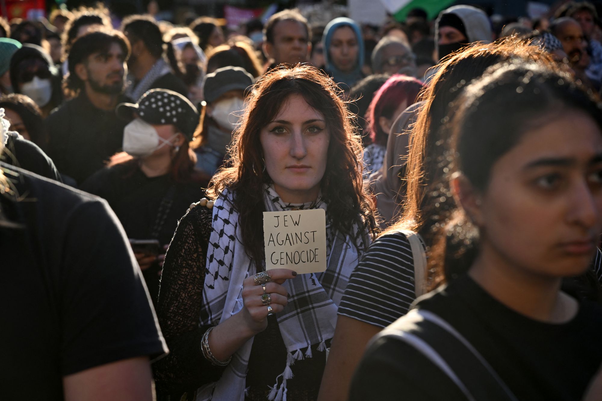Protesters march during a rally against the visit of Israeli president Isaac Herzog in Melbourne on 12 February 2026