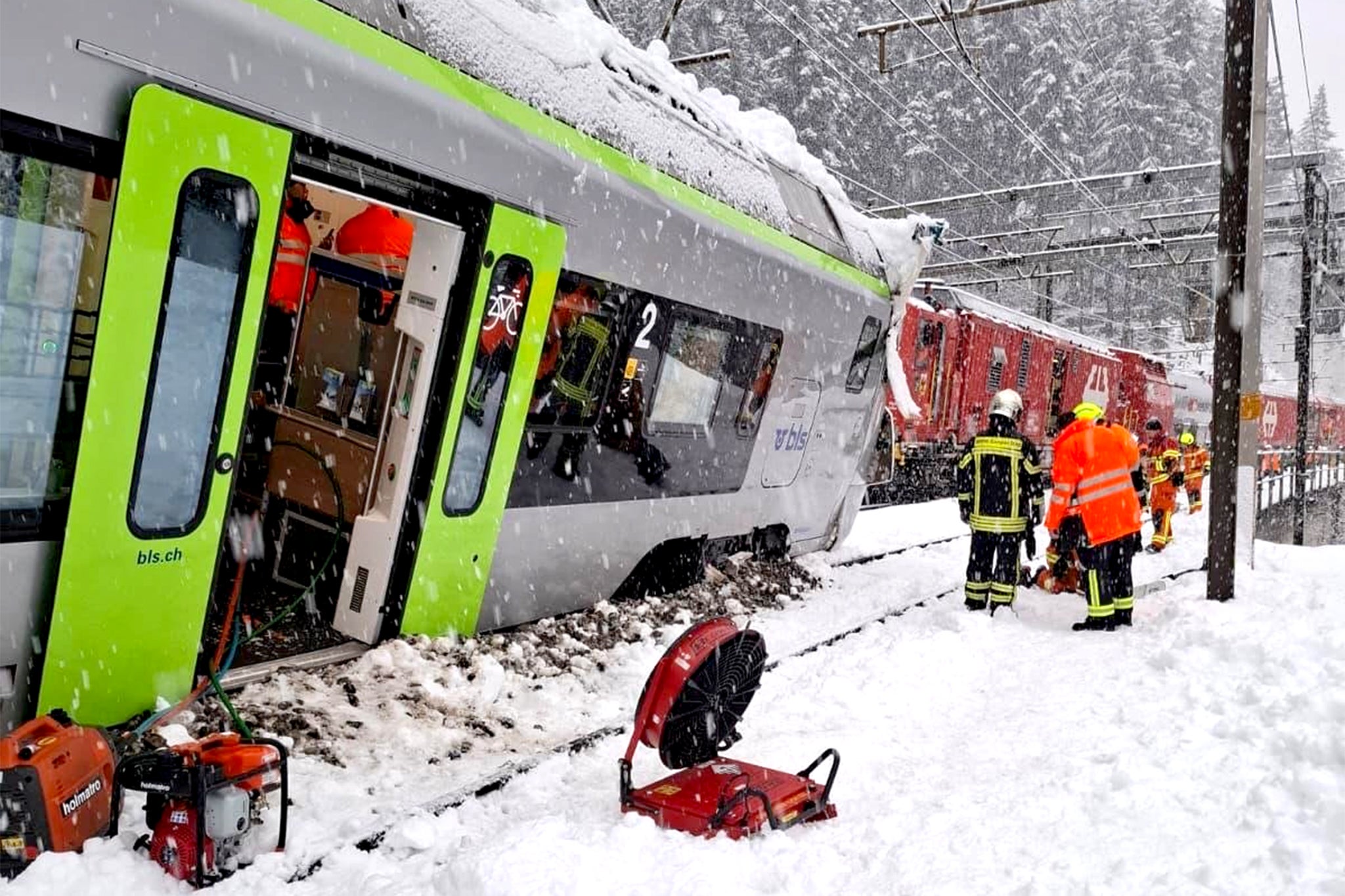 Rescue teams at the scene this morning after an avalanche struck the train