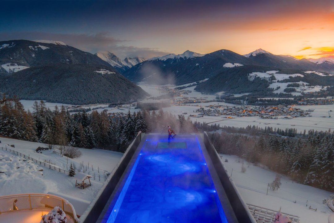 The outdoor infinity pool is heated to 33 degrees