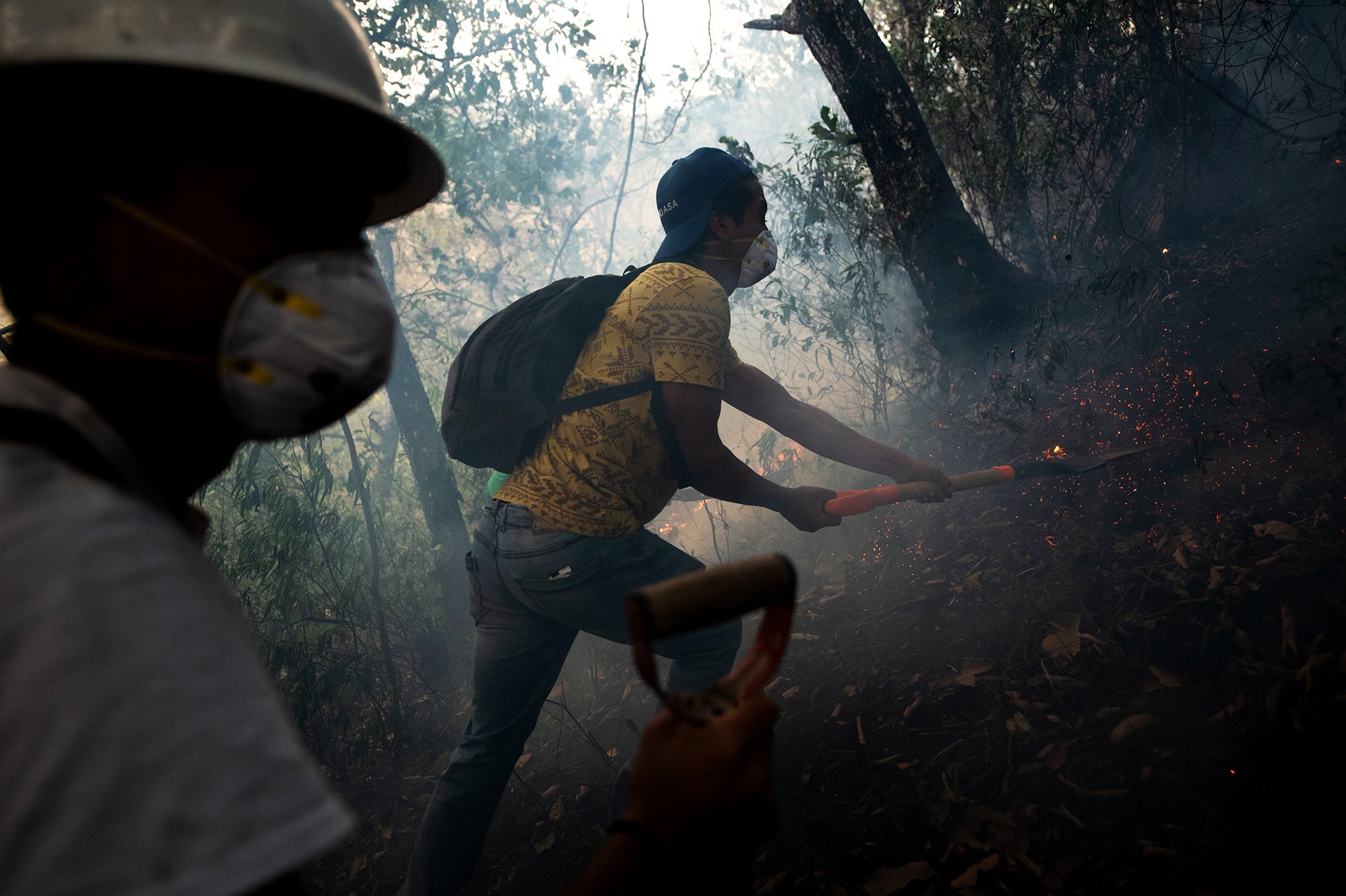 Locals fight the wildfrires that have ravaghed the Yucatan peninsula in recent years