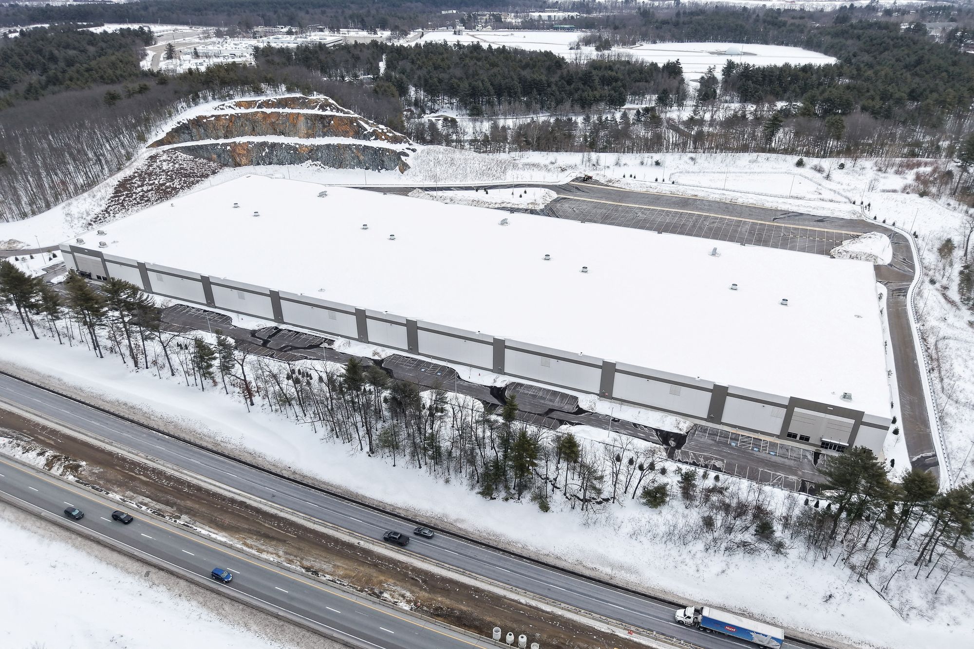 With a surge of new federal funding, ICE is also radically expanding its detention space with converted warehouses that can detain up to 10,000 people, including a facility in New Hampshire that state and local officials do not want