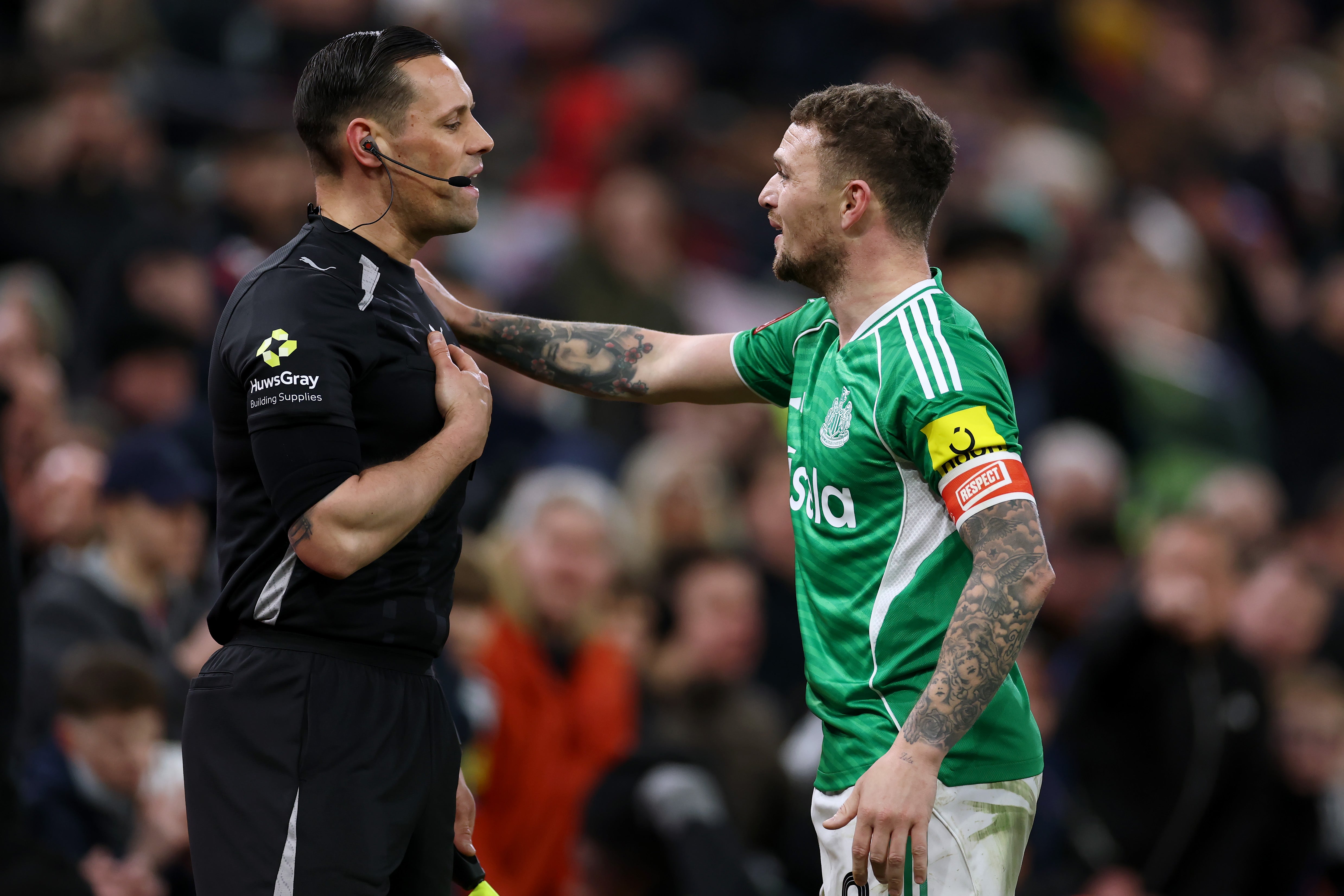 Kieran Trippier appeals to assistant referee Nick Greenhalgh after referee Chris Kavanagh failed to award a penalty during the FA Cup tie between Aston Villa and Newcastle United