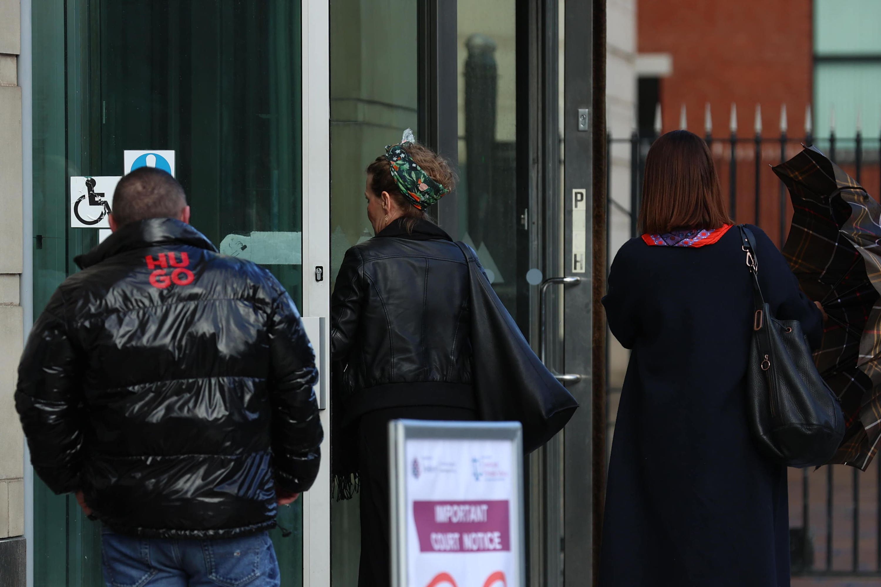 Fiona Donohoe (centre), the mother of 14-year-old Noah Donohoe, arrives at Belfast Coroner’s Court on Monday (Liam McBurney/PA)