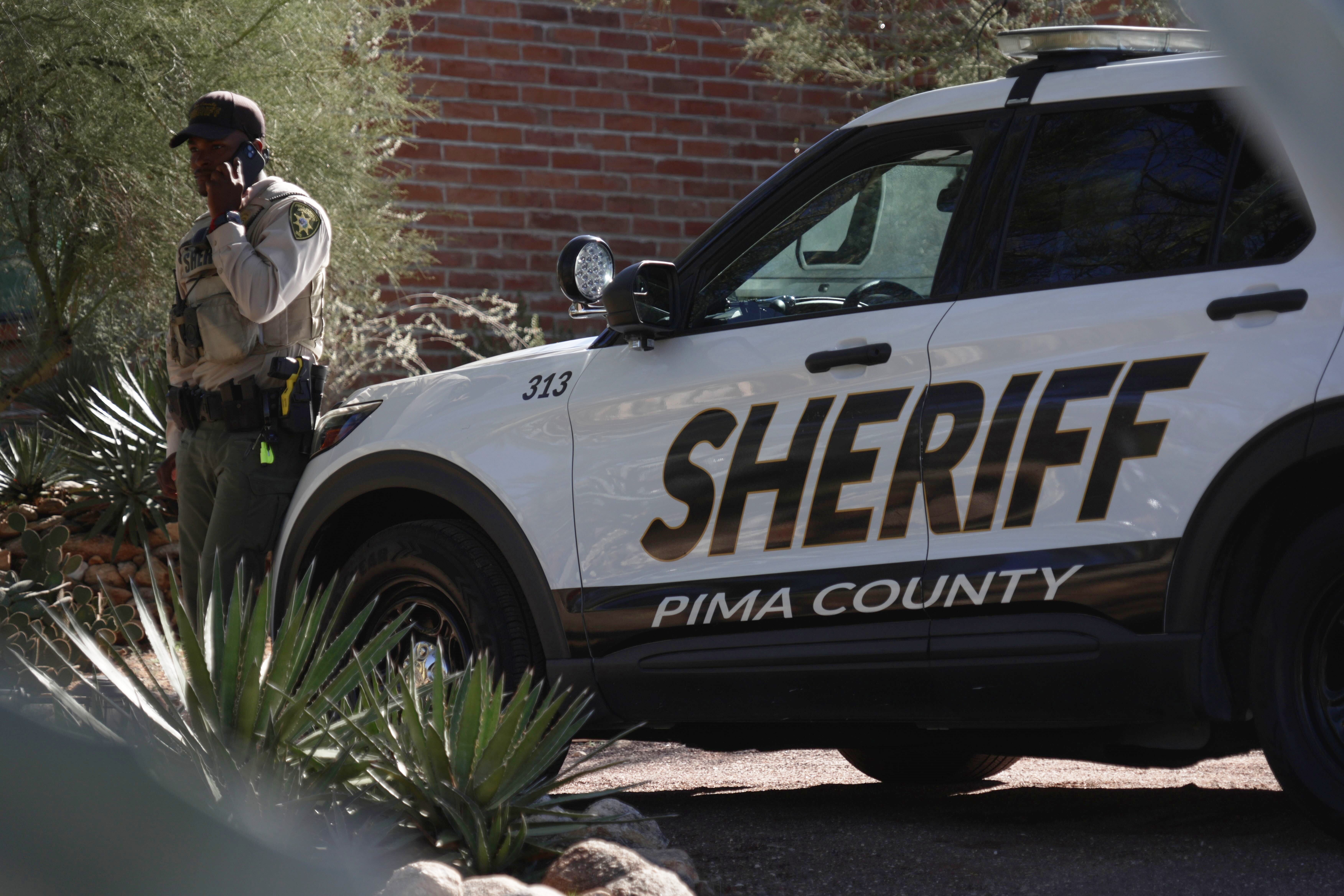 A Pima County Sheriff’s Office deputy remains on guard outside Nancy Guthrie’s home near Tucson, Arizona. On Monday, Pima County Sheriff’ Chris Nanos said that all of Guthrie’s family — including her children and her siblings — were cleared as suspects