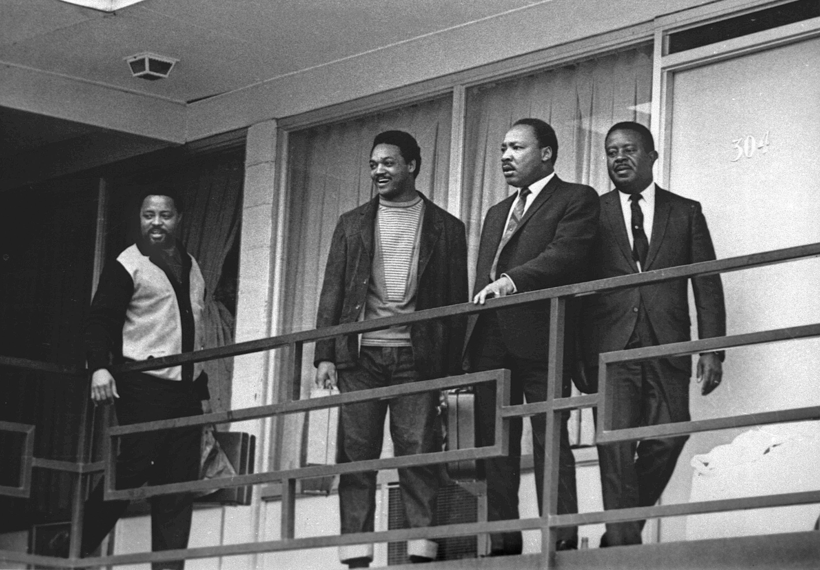Rev. Dr. Martin Luther King Jr stands with Hosea Williams, left, Jesse Jackson, second from left, and Ralph Abernathy, right, on the balcony of the Lorraine Motel in Memphis, Tennessee, a day before his assassination in the same location