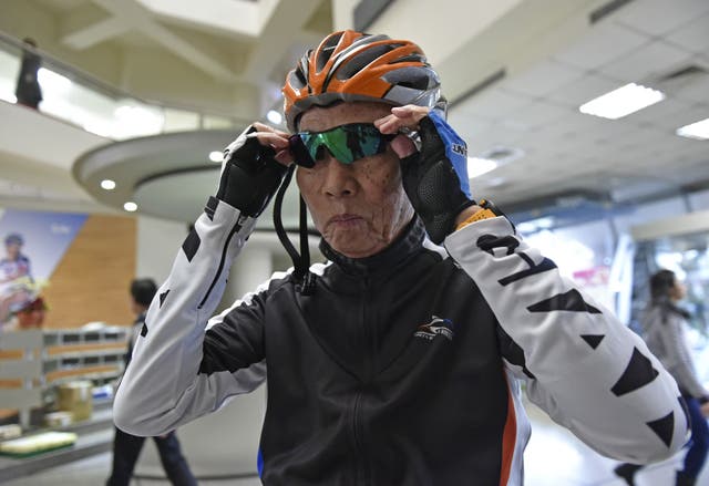 <p>King Liu, chairman of the world's biggest bicycle maker Giant Manufacturing Co., poses for photographs in central Taichung</p>