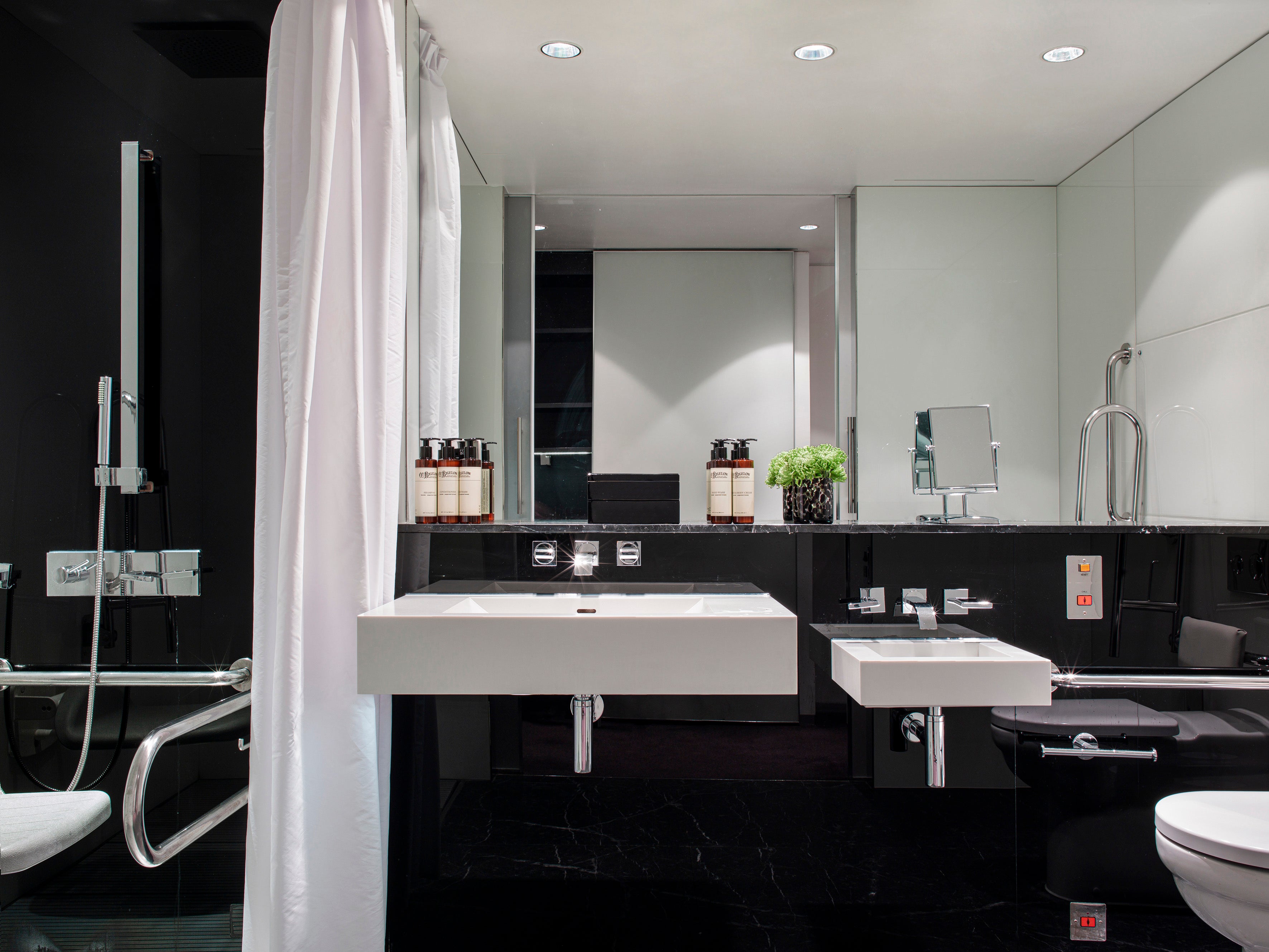 A contemporary accessible bathroom at ME London