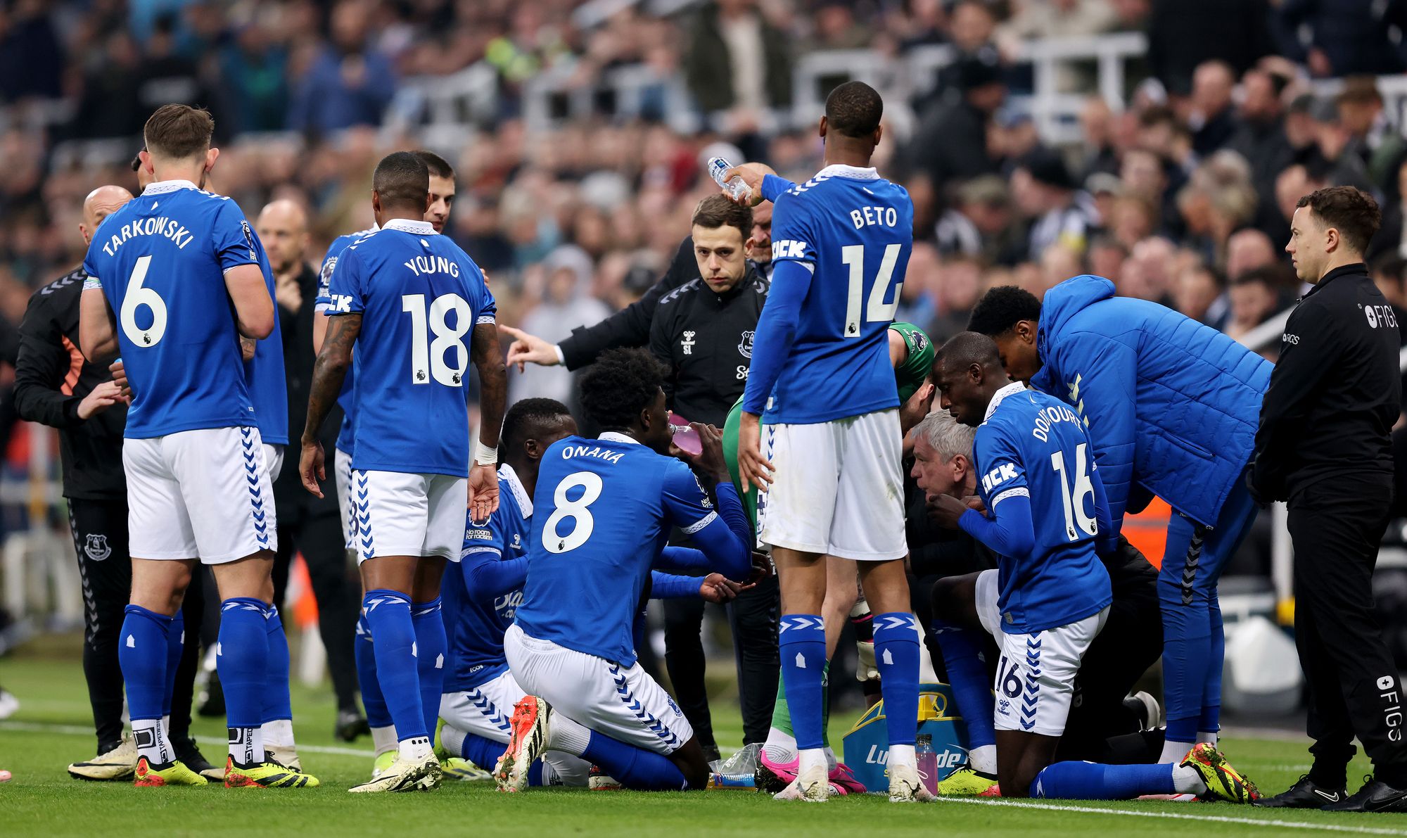<p>Players break their fast during a game between Everton and Newcastle in April 2024</p>