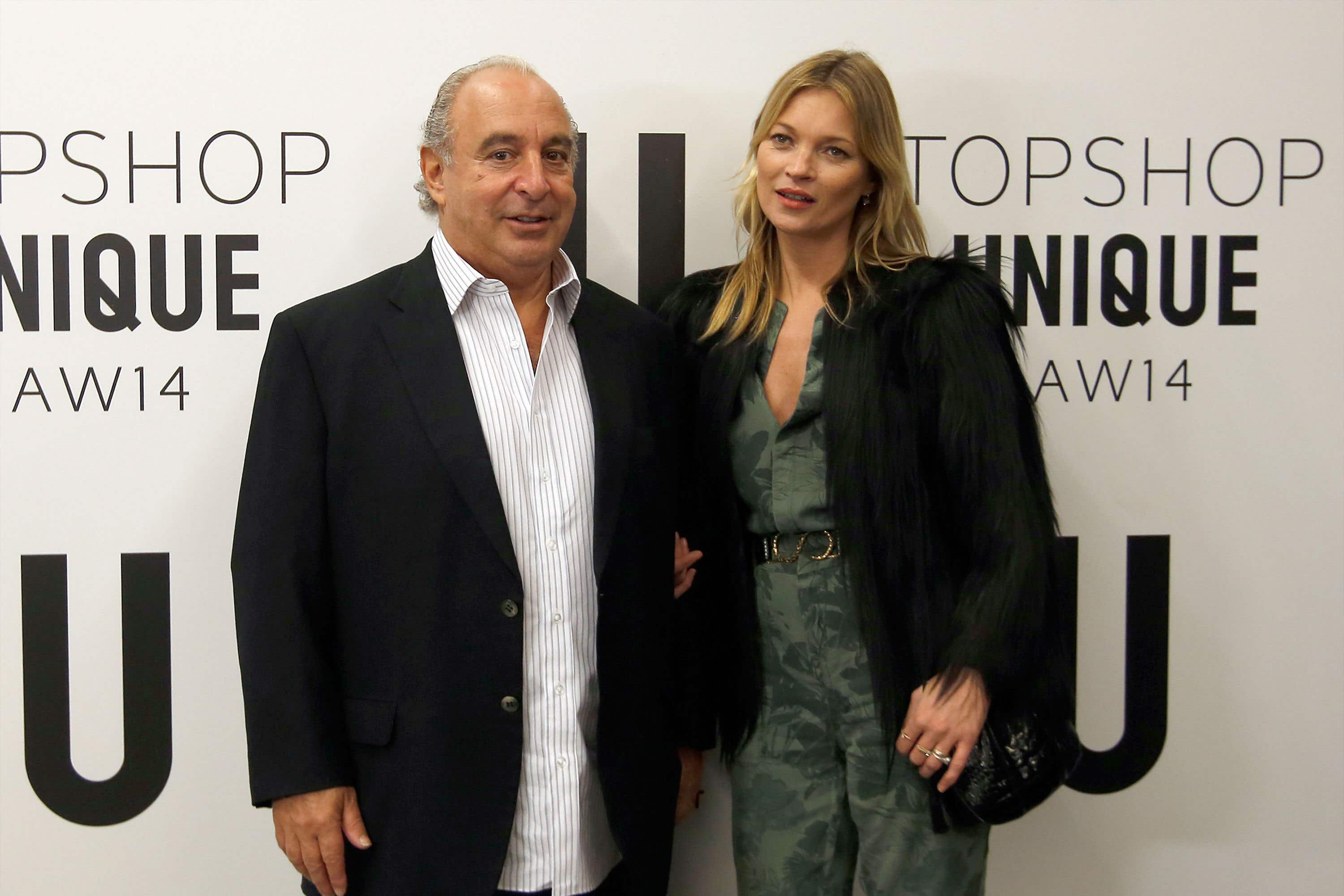 Sir Philip Green and Kate Moss in 2014 at the launch of a Topshop Unique collection (Anthony Devlin/PA)