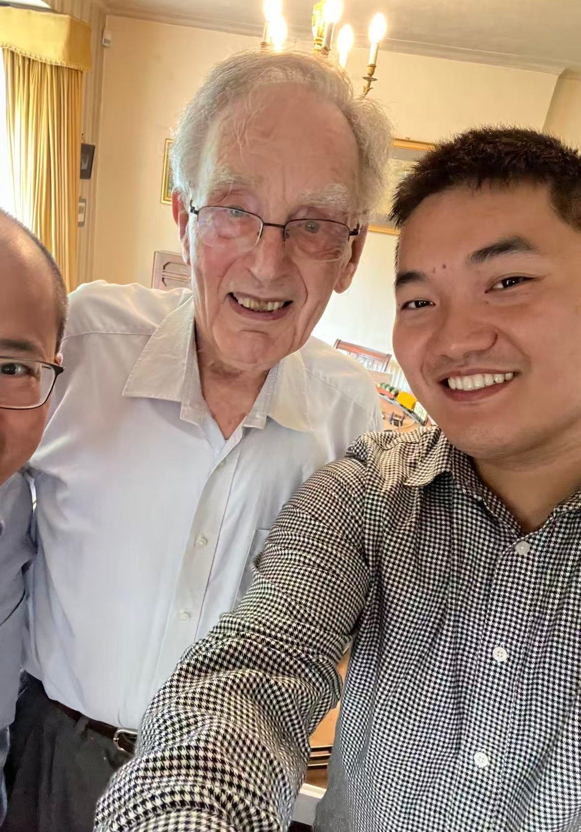 Scientist Dr Jiayang Li (right), from the University of Bristol with his 89-year-old mentor Peter Langlois (centre)
