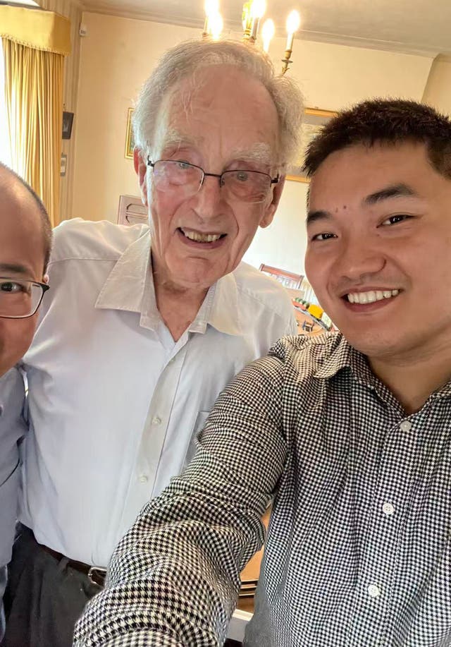 <p>Scientist Dr Jiayang Li (right), from the University of Bristol with his 89-year-old mentor Peter Langlois (centre)</p>