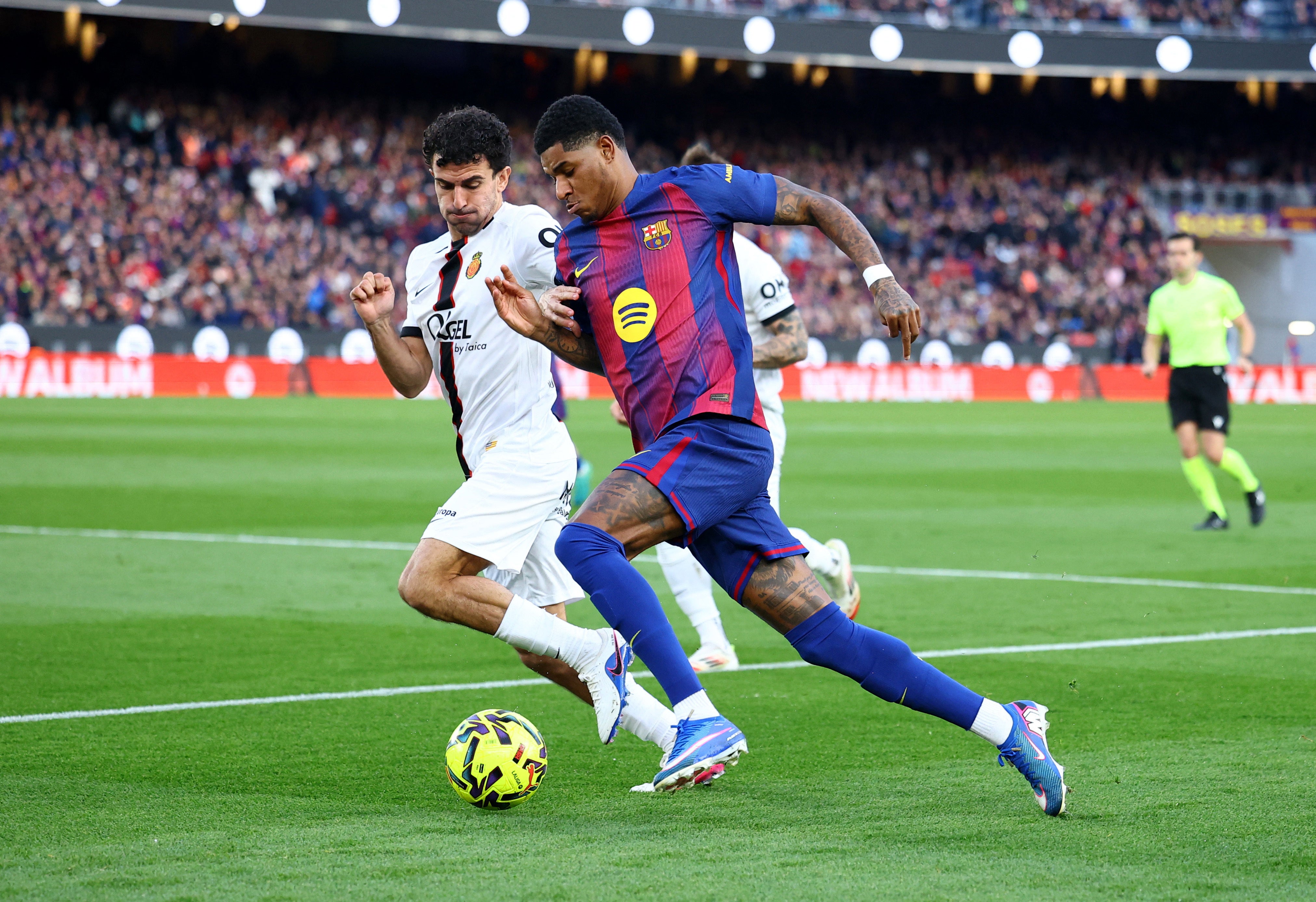 <p>Barcelona's Marcus Rashford in action</p>