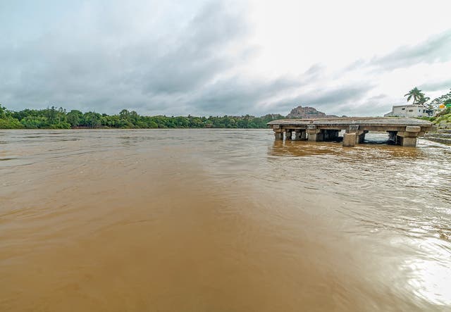 <p>File photo shows waters from the swollen Tungabhadra River  flooding historic monuments at Hampi, a Unesco World Heritage site, in India's southern Karnataka state</p>