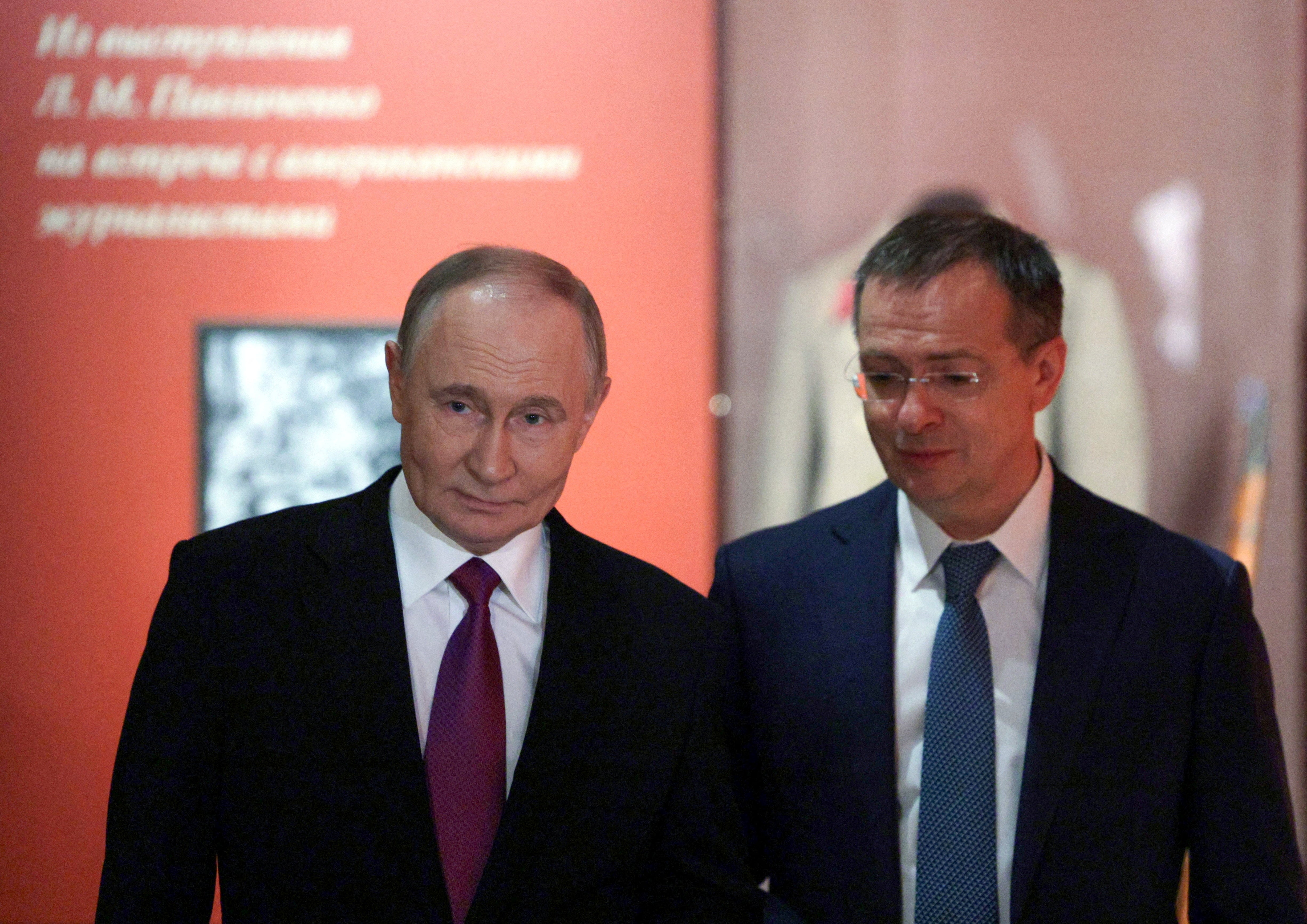 File: Russia's president Vladimir Putin and his aide Vladimir Medinsky visit the exhibition Orthodox Rus' during National Unity Day celebrations in Moscow