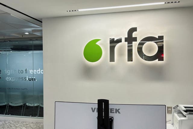 <p>File. Radio Free Asia logo is displayed at its Washington office on 15 March 2025</p>