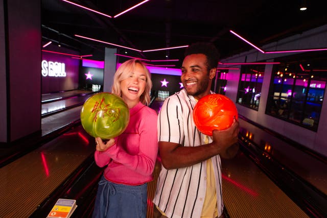 Couples swapped romantic dinners for a night at the bowling lanes this Valentine’s Day (Hollywood Bowl/PA)