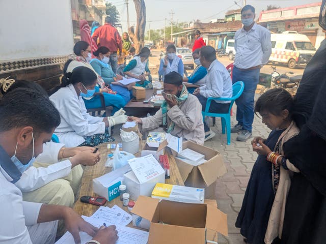<p>Healthcare workers screen villagers at a medical camp in Chhainsa, Haryana, India</p>