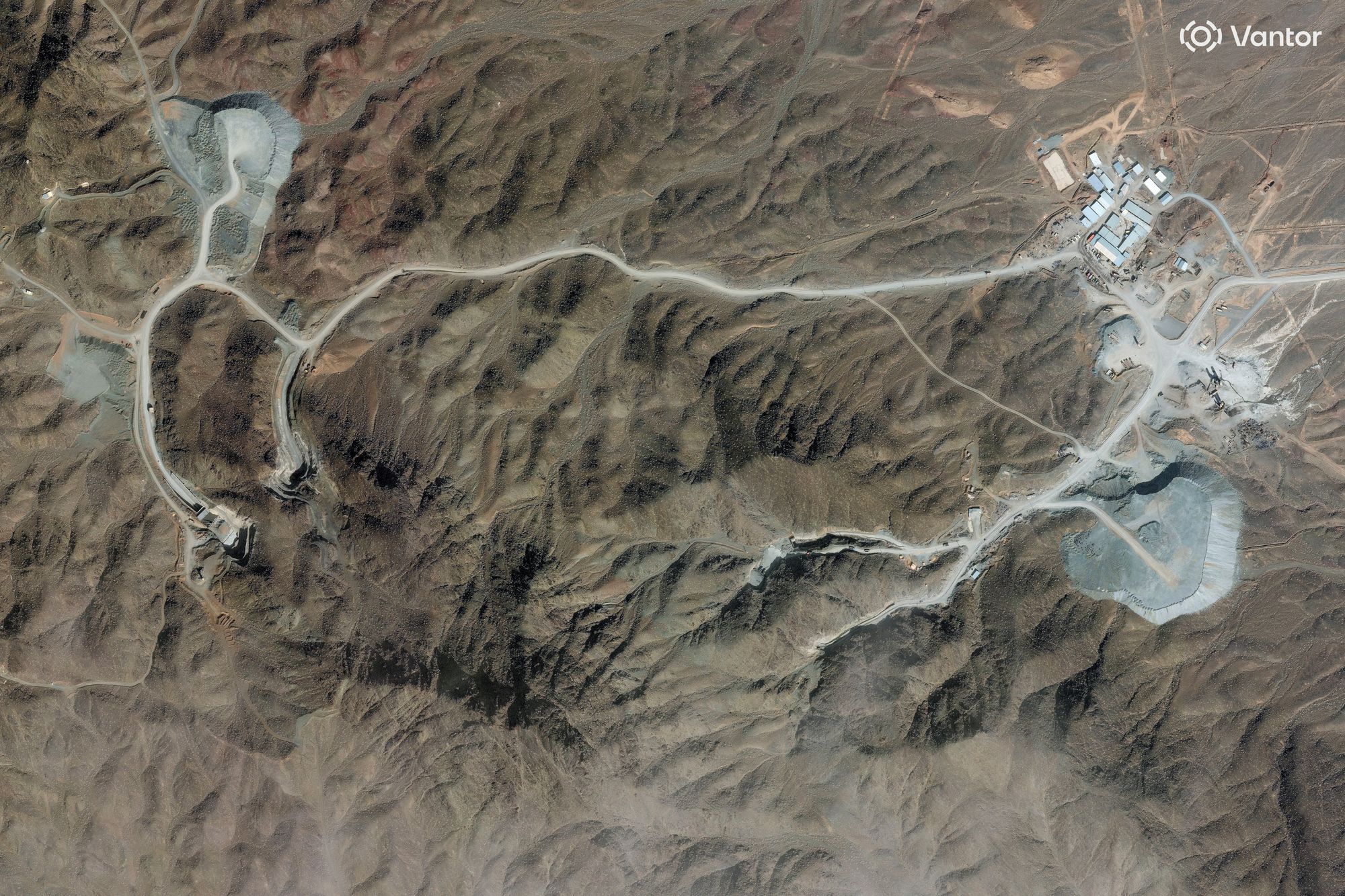 <p>A satellite image shows ongoing efforts to harden and strengthen a facility's two tunnel entrances at a complex near Nantanz, Iran on 10 February, 2026</p>