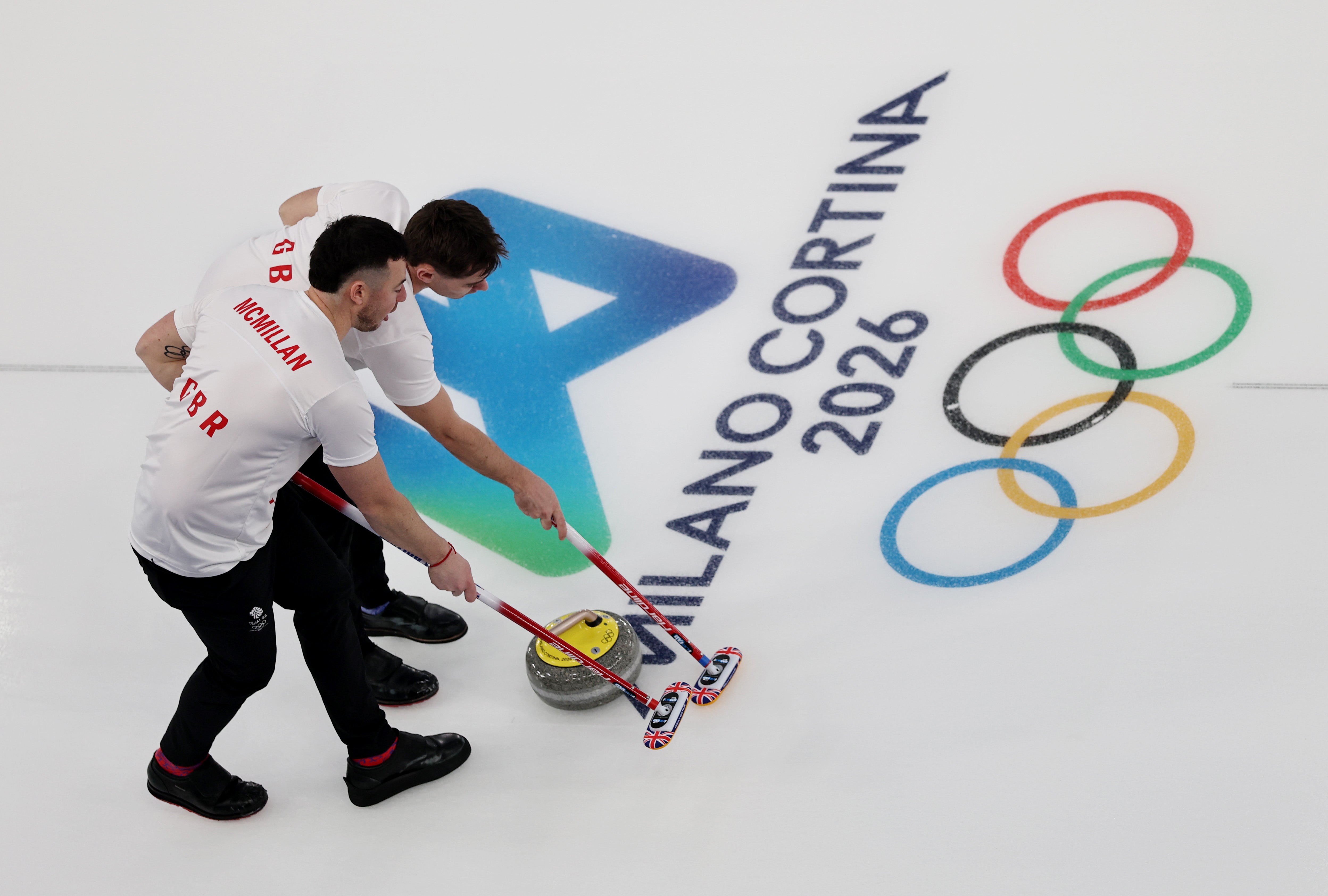 Хами Мекмилан и Грант Харди из тима Велике Британије такмиче се против тима Сједињених Држава